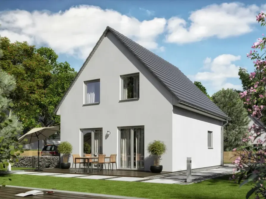 Das Raumwunder 90 mit Satteldach und Blick in den Garten mit Terrasse